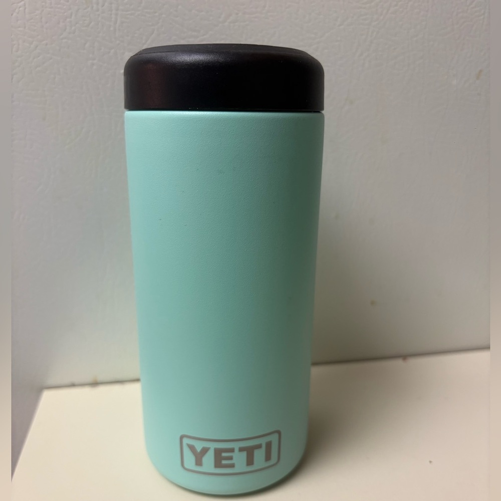 Slim can teal yeti koozie